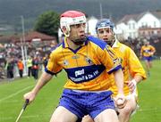30 June 2007; Kevin DIleen, Clare, in action against Shane McNaughton, Antrim. Guinness All-Ireland Hurling Championship Qualifier, Group 1A, Round 1, Antrim v Clare, Casement Park, Belfast, Co. Antrim. Picture credit: Oliver McVeigh / SPORTSFILE