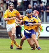 30 June 2007; Gerry O'Grady, Clare, in action against Michael Herron and Shane McNaughton, Antrim. Guinness All-Ireland Hurling Championship Qualifier, Group 1A, Round 1, Antrim v Clare, Casement Park, Belfast, Co. Antrim. Picture credit: Oliver McVeigh / SPORTSFILE
