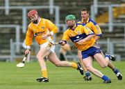 30 June 2007; Paddy McGill, Antrim, in action against Diarmuid McMahon, Clare. Guinness All-Ireland Hurling Championship Qualifier, Group 1A, Round 1, Antrim v Clare, Casement Park, Belfast, Co. Antrim. Picture credit: Oliver McVeigh / SPORTSFILE