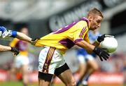 1 July 2007; Matty Forde, Wexford, has his jersey pulled by Joe Higgins, Laois. Bank of Ireland Leinster Senior Football Championship Semi-Final, Laois v Wexford, Croke Park, Dublin. Picture credit: David Maher / SPORTSFILE