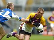 1 July 2007; Matty Forde, Wexford, in action against Joe Higgins, Laois. Bank of Ireland Leinster Senior Football Championship Semi-Final, Laois v Wexford, Croke Park, Dublin. Picture credit: David Maher / SPORTSFILE