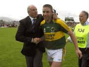 1 July 2007; Kerry's Darragh O Se is congratulated by County Board Chairman Sean Walsh after the final whistle. Bank of Ireland Munster Senior Football Championship Final, Kerry v Cork, Fitzgerald Stadium, Killarney, Co. Kerry. Picture credit: Brendan Moran / SPORTSFILE