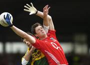 1 July 2007; Michael Cussel, Cork, contests a dropping ball with Tom O'Sullivan, Kerry. Bank of Ireland Munster Senior Football Championship Final, Kerry v Cork, Fitzgerald Stadium, Killarney, Co. Kerry. Picture credit: Brendan Moran / SPORTSFILE
