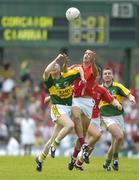 1 July 2007; Pearse O'Neill, Cork, contests a kick out with Tomas O Se, Kerry. Bank of Ireland Munster Senior Football Championship Final, Kerry v Cork, Fitzgerald Stadium, Killarney, Co. Kerry. Picture credit: Brendan Moran / SPORTSFILE