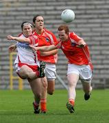 1 July 2007; Gemma Begley, Tyrone, in action against Caoimhe Marley, Armagh. TG4 Ladies Ulster Senior Football Championship Final, Armagh v Tyrone, St Tighearnach's Park, Clones, Co. Monaghan. Picture credit: Oliver McVeigh / SPORTSFILE