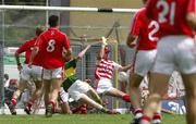 1 July 2007; Colm Cooper shoots past Cork's Paddy O'Shea to score a goal for Kerry. Bank of Ireland Munster Senior Football Championship Final, Kerry v Cork, Fitzgerald Stadium, Killarney, Co. Kerry. Picture credit: Ray McManus / SPORTSFILE