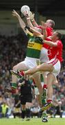 1 July 2007; Michael Quirke, Kerry, in action against Cork players Nicholas Murphy and John Miskella. Bank of Ireland Munster Senior Football Championship Final, Kerry v Cork, Fitzgerald Stadium, Killarney, Co. Kerry. Picture credit: Ray McManus / SPORTSFILE