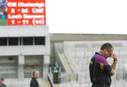 1 July 2007; A dejected Wexford manager John Meyler, with the scoreboard in the background, during the closing stages of the game. Guinness Leinster Senior Hurling Championship Final, Kilkenny v Wexford, Croke Park, Dublin. Picture credit: David Maher / SPORTSFILE