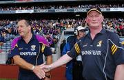 1 July 2007; Kilkenny manager Brian Cody, right, shakes hands with Wexford manager John Meyler at the end of the game. Guinness Leinster Senior Hurling Championship Final, Kilkenny v Wexford, Croke Park, Dublin. Picture credit: David Maher / SPORTSFILE