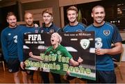 17 November 2014; Republic of Ireland players, from left, Rob Elliott, Darren Randolph, Jeff Henderick, Anthony Pilkington and Jonathan Walters, before the squad caps presentation, show their support for Republic of Ireland Senior Womens International Stephanie Roche, who was  nominated for the FIFA Puskás Award for the best goal of 2014. Portmarnock Hotel & Golf Links, Portmarnock, Co. Dublin Picture credit: David Maher / SPORTSFILE