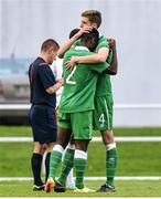 18 November 2014; Republic of Ireland captain Noe Baba is consoled by team-mate Fiacre Kelleher, right, after he was sent off by referee Sergei Tsinkevich. UEFA European U19 Championship 2014/15, Qualifying Round, Republic of Ireland v Switzerland. Regional Sports Centre, Waterford. Picture credit: Matt Browne / SPORTSFILE