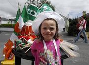 1 July 2007; Three-and a half year old Lily O'Brien assists at her parents stall outside the ground. Bank of Ireland Munster Senior Football Championship Final, Kerry v Cork, Fitzgerald Stadium, Killarney, Co. Kerry. Picture credit: Ray McManus / SPORTSFILE