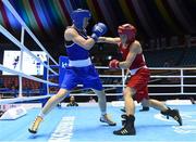 20 November 2014; Mira Potkonen, Finland, right, exchanges punches with Katie Taylor, Ireland, during their Women's Light 60kg last 16 bout. 2014 AIBA Elite Women's World Boxing Championships, Jeju, Korea. Photo by Sportsfile