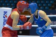 20 November 2014; Katie Taylor, Ireland, right, exchanges punches with Mira Potkonen, Finland, during their Women's Light 60kg last 16 bout. 2014 AIBA Elite Women's World Boxing Championships, Jeju, Korea. Photo by Sportsfile