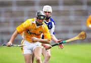 7 July 2007; Sean Delarghy, Antrim, in action against J.J. McHugh, Laois. Guinness All-Ireland Senior Hurling Championship Qualifier, Group 1A, Round 2, Antrim v Laois, Casement Park, Belfast, Co. Antrim. Picture credit: Russell Pritchard / SPORTSFILE