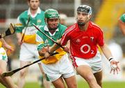 7 July 2007; Ronan Curran, Cork, in action against Damien Murray, Offaly. Guinness All-Ireland Senior Hurling Championship Qualifier, Group 1B, Round 2, Cork v Offaly, Pairc Ui Chaoimh, Cork. Photo by Sportsfile