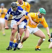 7 July 2007; Michael Herron, Antrim, in action against James Prior, Laois. Guinness All-Ireland Senior Hurling Championship Qualifier, Group 1A, Round 2, Antrim v Laois, Casement Park, Belfast, Co. Antrim. Picture credit: Russell Pritchard / SPORTSFILE