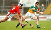 7 July 2007; Michael Cordial, Offaly, in action against Ronan Curran, Cork. Guinness All-Ireland Senior Hurling Championship Qualifier, Group 1B, Round 2, Cork v Offaly, Pairc Ui Chaoimh, Cork. Photo by Sportsfile