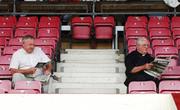 7 July 2007; Two punters reading in the stand before the start of the game. Guinness All-Ireland Senior Hurling Championship Qualifier, Group 1B, Round 2, Cork v Offaly, Pairc Ui Chaoimh, Cork. Photo by Sportsfile