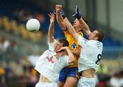 7 July 2007; Karol Mannion, Roscommon, in action against Ronan Sweeney, 8, and  Mark Hogarty, Kildare. Bank of Ireland All-Ireland Senior Football Championship Qualifier, Round 1, Roscommon v Kildare, Dr. Hyde Park, Roscommon. Picture credit: Ray McManus / SPORTSFILE