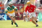 7 July 2007; Damien Murray, Offaly, in action against Shane Murphy, Cork. Guinness All-Ireland Senior Hurling Championship Qualifier, Group 1B, Round 2, Cork v Offaly, Pairc Ui Chaoimh, Cork. Photo by Sportsfile
