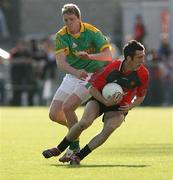 7 July 2007; Dan Gordon, Down, in action against Kevin Reilly, Meath. Bank of Ireland All-Ireland Senior Football Championship Qualifier, Round 1, Down v Meath, Pairc Esler, Newry, Co. Down. Picture credit: Oliver McVeigh / SPORTSFILE