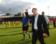 7 July 2007; Leeds United manager Denis Wise salutes the crowd before the match. Pre-season Friendly, Shelbourne v Leeds United, Tolka Park, Dublin. Picture credit: Brian Lawless / SPORTSFILE