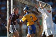 7 July 2007; Eugene Cloonan, Galway, in the company of Gerry O'Grady, Clare, argues with an umpire as he signals a wide for Galway. It was subsequently adjudged to be a point for Galway after consultation between both umpires and referee Dickie Murphy. Guinness All-Ireland Senior Hurling Championship Qualifier, Group 1A, Round 2, Clare v Galway, Cusack Park, Ennis, Co. Clare. Picture credit: Brendan Moran / SPORTSFILE