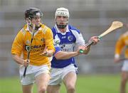7 July 2007; Sean Delarghy, Antrim, in action against J.J. McHugh, Laois. Guinness All-Ireland Senior Hurling Championship Qualifier, Group 1A, Round 2, Antrim v Laois, Casement Park, Belfast, Co. Antrim. Picture credit: Russell Pritchard / SPORTSFILE