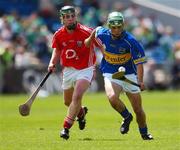 8 July 2007; John O'Neill, Tipperary, in action against Eoin McCarthy, Cork. ESB Munster Minor Hurling Championship Final, Cork v Tipperary, Semple Stadium, Thurles, Co. Tipperary. Picture credit: David Maher / SPORTSFILE