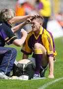8 July 2007; Adrian Flynn, Wexford, gets staples inserted in his eye during the first half. Bank of Ireland All-Ireland Senior Football Championship Qualifier, Round 1, Fermanagh v Wexford, St Tighearnach's Park, Clones, Co. Monaghan. Picture credit: Oliver McVeigh / SPORTSFILE