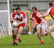 8 July 2007; Mark Lynch, Derry, in action against Kieran McGeeney and Ciaran McKeever, Armagh. Bank of Ireland All-Ireland Senior Football Championship Qualifier, Round 1, Armagh v Derry, St Tighearnach's Park, Clones, Co. Monaghan. Picture credit: Oliver McVeigh / SPORTSFILE