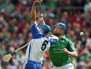 8 July 2007; Brian Begley, Limerick, hits the ball past Declan Prendergast, Waterford, to score his side's first goal. Guinness Munster Senior Hurling Championship Final, Waterford v Limerick, Semple Stadium, Thurles, Co. Tipperary. Photo by Sportsfile