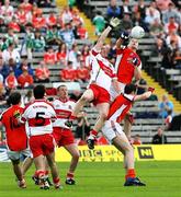 8 July 2007; Paul McGrane, Armagh, in action against Fergal Doherty, Derry. Bank of Ireland All-Ireland Senior Football Championship Qualifier, Round 1, Armagh v Derry, St Tighearnach's Park, Clones, Co. Monaghan. Picture credit: Oliver McVeigh / SPORTSFILE