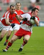 8 July 2007; Michael McGoldrick, Derry, in action against Martin O'Rourke, Armagh. Bank of Ireland All-Ireland Senior Football Championship Qualifier, Round 1, Armagh v Derry, St Tighearnach's Park, Clones, Co. Monaghan. Picture credit: Oliver McVeigh / SPORTSFILE