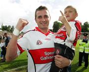 8 July 2007; James Conway, Derry, celebrates with his 3 year old son Sean, after victory over Armagh. Bank of Ireland All-Ireland Senior Football Championship Qualifier, Round 1, Armagh v Derry, St Tighearnach's Park, Clones, Co. Monaghan. Picture credit: Oliver McVeigh / SPORTSFILE