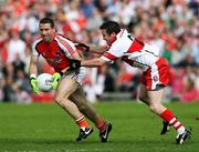 8 July 2007; Diarmaid Marsden, Armagh, in action against Michael McGoldrick, Derry. Bank of Ireland All-Ireland Senior Football Championship Qualifier, Round 1, Armagh v Derry, St Tighearnach's Park, Clones, Co. Monaghan. Picture credit: Oliver McVeigh / SPORTSFILE