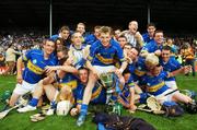 8 July 2007; Tipperary minor players celebrate at the end of the game. ESB Munster Minor Hurling Championship Final, Cork v Tipperary, Semple Stadium, Thurles, Co. Tipperary. Picture credit: David Maher / SPORTSFILE