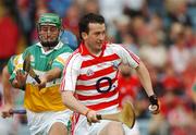 7 July 2007; Donal Og Cusack, Cork, gets away from Damien Murray, Offaly. Guinness All-Ireland Senior Hurling Championship Qualifier, Group 1B, Round 2, Cork v Offaly, Pairc Ui Chaoimh, Cork. Photo by Sportsfile