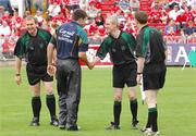 7 July 2007; Offaly manager John McIntyre shakes hands with referee Eamonn Morris before the start of the game. Guinness All-Ireland Senior Hurling Championship Qualifier, Group 1B, Round 2, Cork v Offaly, Pairc Ui Chaoimh, Cork. Photo by Sportsfile