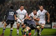 21 November 2014; Sean Reidy, Ulster, is tackled by James King, Ospreys. Guinness PRO12, Round 8, Ulster v Ospreys. Kingspan Stadium, Ravenhill Park, Belfast, Co. Antrim. Picture credit: Oliver McVeigh / SPORTSFILE