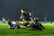 21 November 2014; Danie Poolman, Connacht, dives over to score his side's first try of the game despite the tackle of Michele Visentin, right, and Hennie Daniller, Zebre. Guinness PRO12, Round 8, Connacht v Zebre. The Sportsground, Galway. Picture credit: Ramsey Cardy / SPORTSFILE