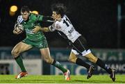 21 November 2014; Danie Poolman, Connacht, is tackled by Michele Visentin, Zebre. Guinness PRO12, Round 8, Connacht v Zebre. The Sportsground, Galway. Picture credit: Ramsey Cardy / SPORTSFILE