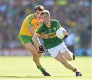 21 September 2014; Brian Rayel, Kerry, in action against Tony McCleneghan, Donegal. Electric Ireland GAA Football All Ireland Minor Championship Final, Kerry v Donegal. Croke Park, Dublin. Picture credit: Stephen McCarthy / SPORTSFILE