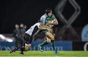21 November 2014; Dave McSharry, Connacht, is tackled by Giulio Bisegni, Zebre. Guinness PRO12, Round 8, Connacht v Zebre. The Sportsground, Galway. Picture credit: Ramsey Cardy / SPORTSFILE