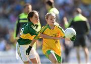 21 September 2014; Katie Teague, St Colmcille’s PS, Co, Derry, representing Donegal, in action against Molly Cummins, Cappawhite NS, Co. Tipperary, representing Kerry, during the INTO/RESPECT Exhibition GoGames. Croke Park, Dublin. Picture credit: Stephen McCarthy / SPORTSFILE
