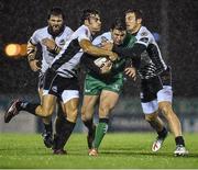 21 November 2014; Danie Poolman, Connacht, is tackled by Michele Visentin, left, and Giulio Bisegni, Zebre. Guinness PRO12, Round 8, Connacht v Zebre. The Sportsground, Galway. Picture credit: Ramsey Cardy / SPORTSFILE
