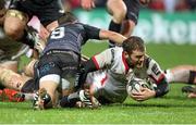21 November 2014; Darren Cave, Ulster, goes over to score a try for his side. Guinness PRO12, Round 8, Ulster v Ospreys. Kingspan Stadium, Ravenhill Park, Belfast, Co. Antrim. Picture credit: John Dickson / SPORTSFILE