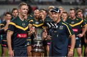 22 November 2014; The Australia captain Joel Selwood and coach Alastair Clarkson are presented with the Cormac McAnallen cup. Virgin Australia International Rules Series, Australia v Ireland. Paterson's Stadium, Perth, Australia. Picture credit: Ray McManus / SPORTSFILE