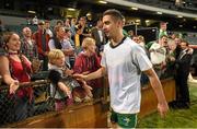 22 November 2014; Ireland's James McCarthy with supporters after the game. Virgin Australia International Rules Series, Australia v Ireland. Paterson's Stadium, Perth, Australia. Picture credit: Ray McManus / SPORTSFILE